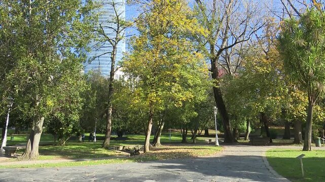 Urban park in Bilbao with gardens, fountains, trees, pergolas, and monuments. Green public space offering a peaceful environment where nature and city design meet.