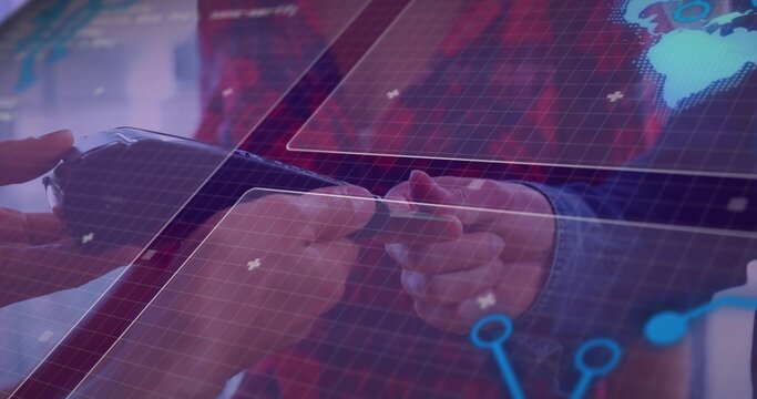 Exchanging two hands with suit cuff passing rectangular device over office table, with HUD overlay