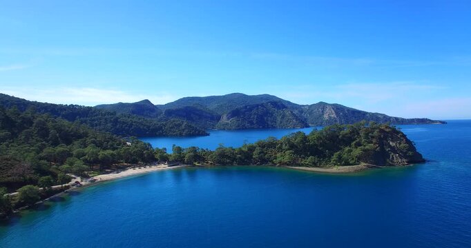 aerial Mediterranean bays and beaches sea side and pine forest scenery fethiye turkey