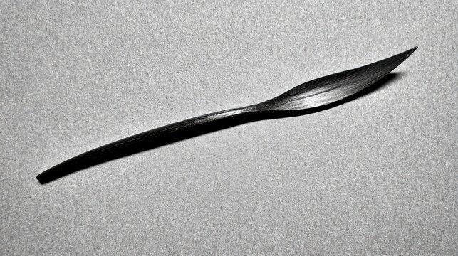 A black and white photo of a knife.