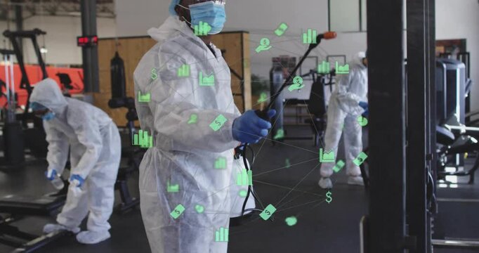 Lead cleaner raising wand, sanitizing gym and team wiping areas while green icons moving over gear
