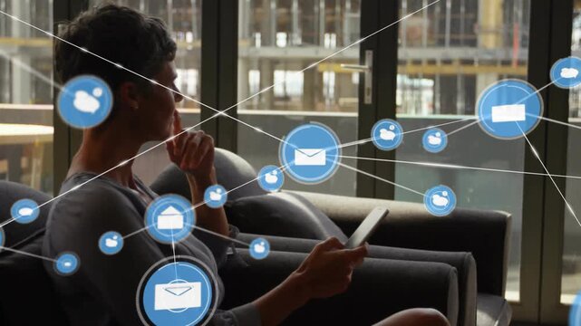 Mature woman tapping smartphone by glass doors, sorting mail via tech network briefcase user icons