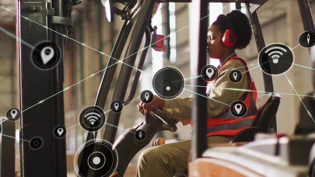Forklift driver reaching sensor donning muffs steering as net icons spreading for warehouse safety