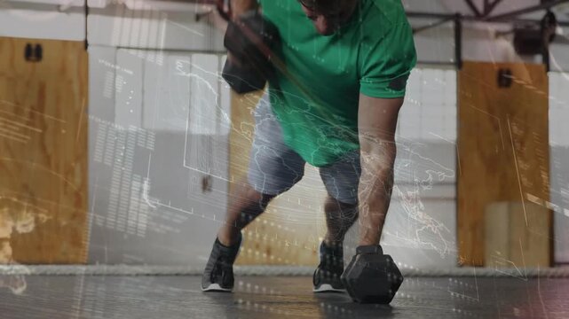Vertical video: Starting man green tee doing pushups and DB rows on gym floor for strength, overlay