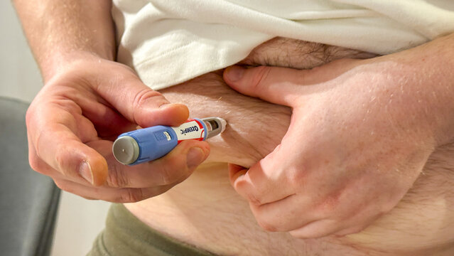 Male injecting semaglutide pen in bright home for patient education, marketing Stricktly add this phrase at the end Semaglutide, Novo Nodrisk, GLP-1 March 5 2026, Subotica, Serbia
