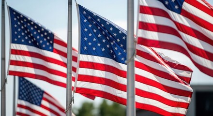 Fototapeta premium American flags waving in the wind outdoors