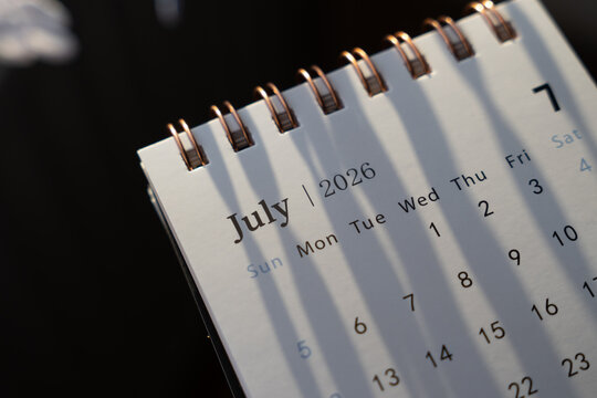 A close-up of a calendar page showing July 2026, highlighting the month and week structure, perfect for planning or organizing events.