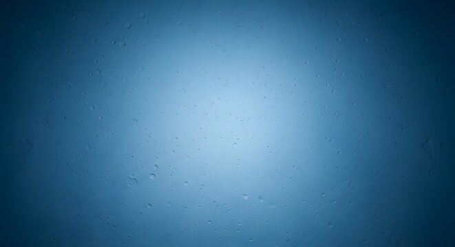 A bright light shining on a dark blue background with a subtle gradient effect