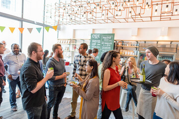 Fototapeta na wymiar Casual social gathering with drinks.