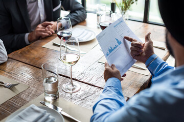 Business meeting with financial discussion.