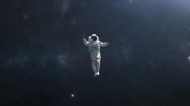 Astronaut floating in space with stars and light in background, possibly for educational or inspirational use