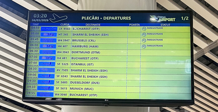 Chisinau, Moldova &ndash; March 3, 2026: Digital departures flight information board displaying international flights inside the terminal of Chisinau International Airport.