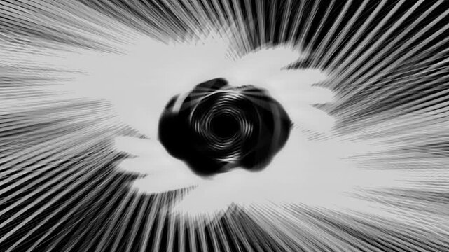 Abstract spiral forms in stark black and white. Rays explode outward from a central vortex