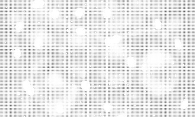 Abstract monochrome halftone pattern featuring a grid of dots with varied light and dark regions Vector