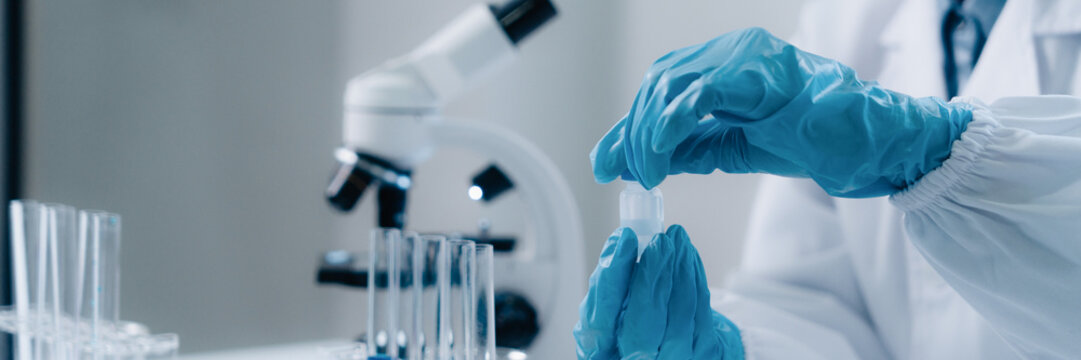 Scientists perform biochemical experiments in a lab for health care solutions