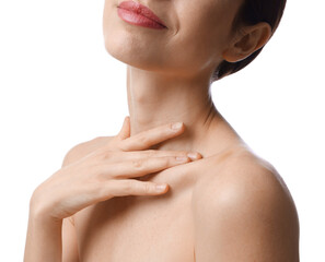 Naklejka premium Beautiful woman touching her neck on white background, closeup