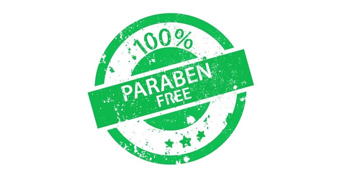 Green circular stamp shows paraben free text. Design has worn, vintage look with white speckles. Used for cosmetic or skincare product labeling