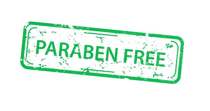 Green ink stamp reads paraben free on white background. Text appears crisp and bold with worn edges. Ideal for cosmetic or skincare product branding. Suitable for health, wellness
