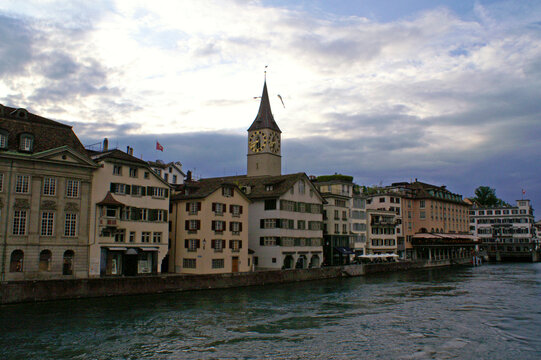 view of zurich and st.peters cathedral from the munsterbucke bridge
