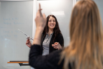 Teacher explaining aviation concepts.