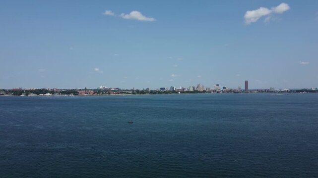 Distant aerial view of the skyline of Buffalo, New York from Fort Erie, Ontario across Lake Erie near the beginning of the Niagara River.