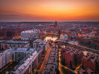 Beautiful old town of Gdansk with historic architecture over the Motlawa river at dusk, Poland