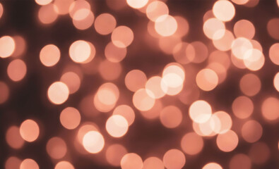 Obraz premium Blurred image featuring numerous soft, circular bokeh lights in warm shades of orange and beige. The lights create a dreamy, atmospheric effect with a gentle glow.