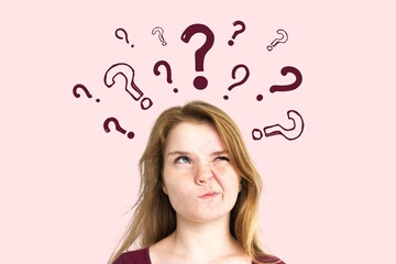 Confused woman with question marks