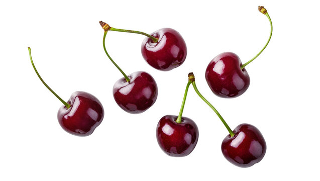Six vibrant red ripe sweet cherries with green stems, naturally scattered and isolated on transparent background, fresh summer fruit PNG