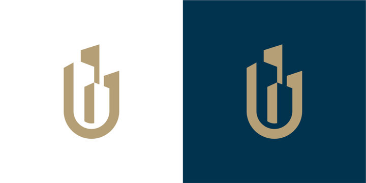 A sleek and modern abstract logo design features a stylized letter 'U' cleverly integrated with geometric building and skyscraper elements, rendered in a sophisticated golden hue. This elegant and min