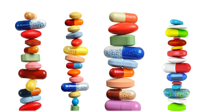 Stack of colorful pills and capsules balancing, isolated on transparent cutout background