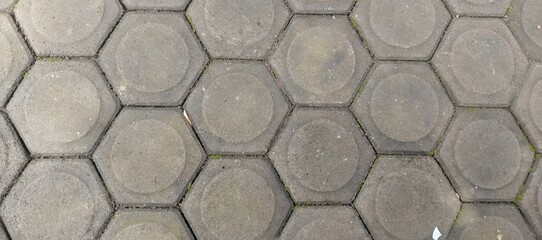 Hexagon concrete paving block pattern texture. Outdoor pavement background for construction and urban design concept