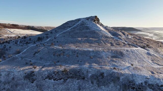 Aerial View of a Distinctiv Mountain Peak Covered in ight Winter Snow