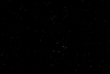 Wide angle photograph of some of the stars and star clusters (star field) surrounding the Orion Nebula (M42) in the constellation Orion. © Irwin Seidman