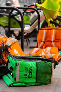 Uber Eats Box, Just Eat Takeaway Food Delivery Courier Bag, Electric Bicycle, E-Bike, Lime Uber Rental Shared Bikes, London, UK, March 2026