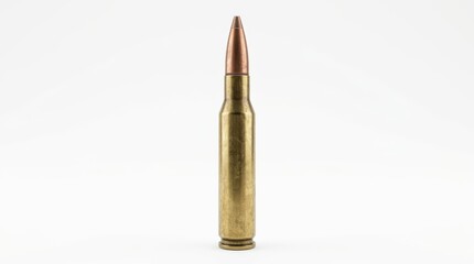A single rifle bullet stands upright in a studio setting, isolated on a clean white background with a neutral mood and sharp focus.
