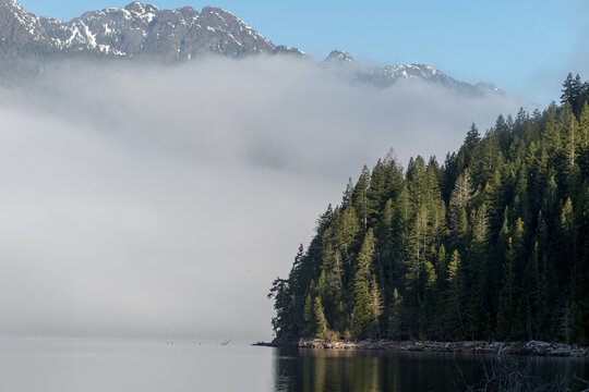 Canada, BC, Vancouver Island, Telegraph Cove.  Fog bank on Nimpkish Lake.  
