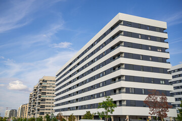 Obraz premium Modern Residential Buildings with a beautiful blue sky background