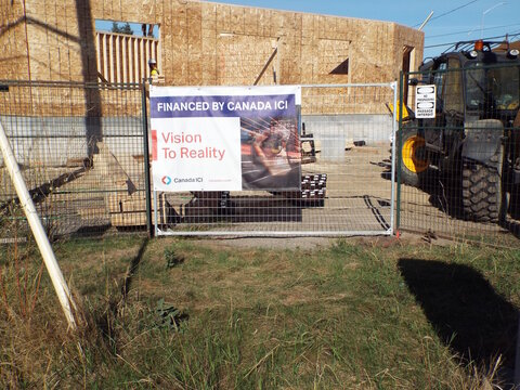 Ottawa, Ontario, Canada-July 20, 2025: A construction site banner for "Canada ICI" at a residential development site highlights their financing role in bringing architectural visions to reality.