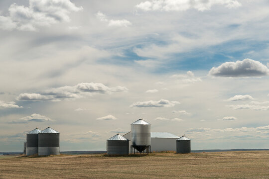 Canada, Saskatchewan, Saskatoon.  Agricultural storage sheds and silos.