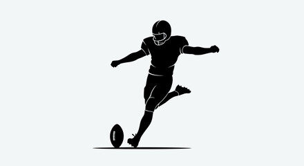 Fototapeta premium Silhouette of American Football Player Kicking Ball During Game