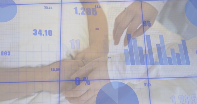 Clasping Korean couple in light top and blue shirt, second hand hovering over white sheets, charts