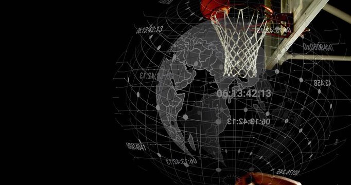 Vertical video: Running man dunking basketball to score at set hoop, globe, yellow-top, copy space