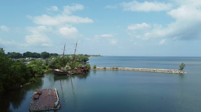 La Grande Hermine, or Jordan Harbour Shipwreck, along the QEW in southwestern Ontario, Canada, on the southern shore of Lake Ontario. Aerial shot from a drone at a low altitude, moving forward. 2021.