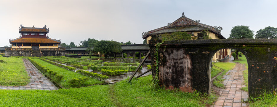 A scenic view of the Imperial City, a walled enclosure within the citadel of Hue, the former imperial capital of Vietnam, showcasing its historic architecture and gardens.