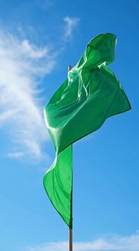 Green Flag Waving Sky Background