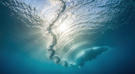Fototapeta premium Sunbeams Pierce Through an Underwater Ocean Wave, Illuminating a Swirling Vortex of Water and Bubbles