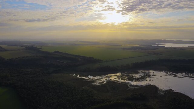 Aerial view of an agricultural field and a wetland in Itap&uacute;a, Paraguay.