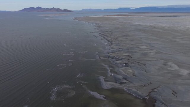 Aerial view of Great Salt Lake shoreline and Antelope Island in Utah