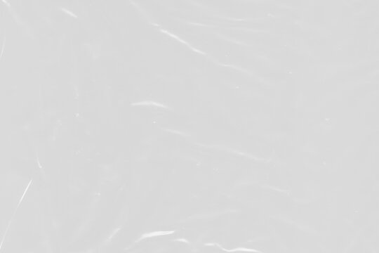 Smooth stretched polyethylene wrapper. Blank transparent PNG object with no background. Soft crease reflections. Excellent for industrial packaging graphic overlays. 